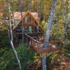 A-Frame Treehouse with Giant Treetop Net - The Carpentree